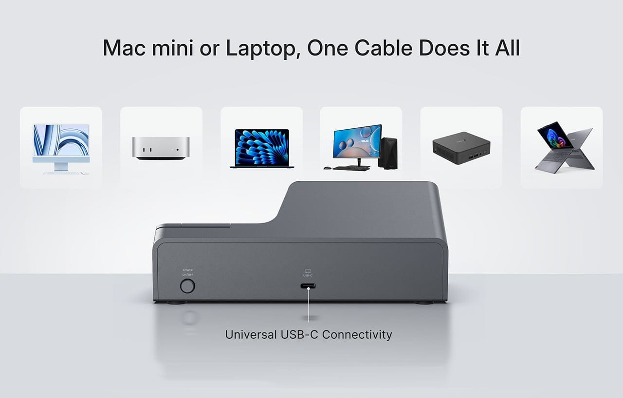 HiDock H1 Lite diletakkan di meja kerja di samping keyboard dan mouse, menyatu dengan gear kreator lainnya
